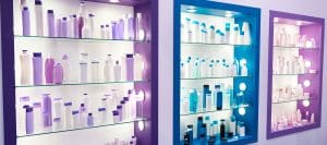 Picture of showcase with bottles of shampoos and conditioners